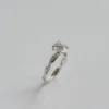 1.5ct Round Solitaire Twist Band Moissanite Ring