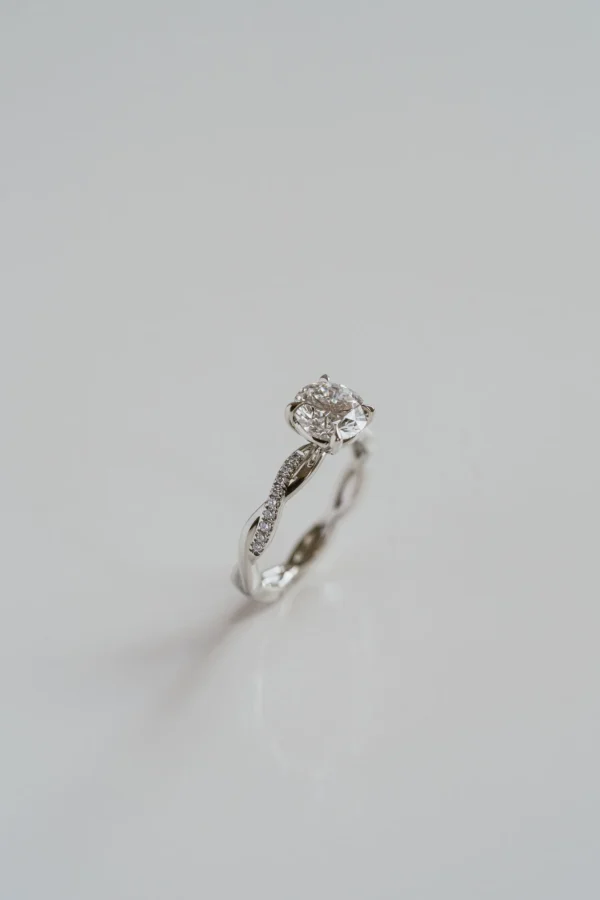 1.5ct Round Solitaire Twist Band Moissanite Ring