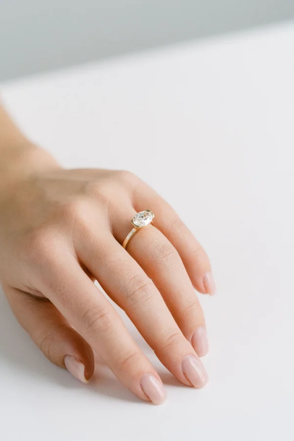 East West Oval Moissanite Half Bezel Ring