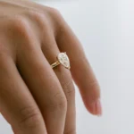 Hidden Halo Pear Moissanite Ring