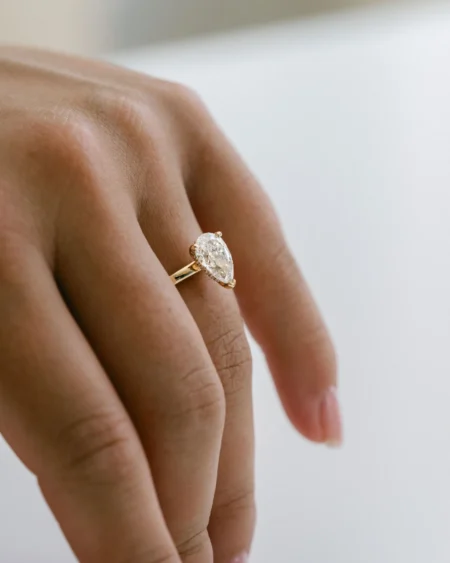 Hidden Halo Pear Moissanite Ring