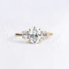 Moissanite Oval Trilogy Ring Yellow Gold